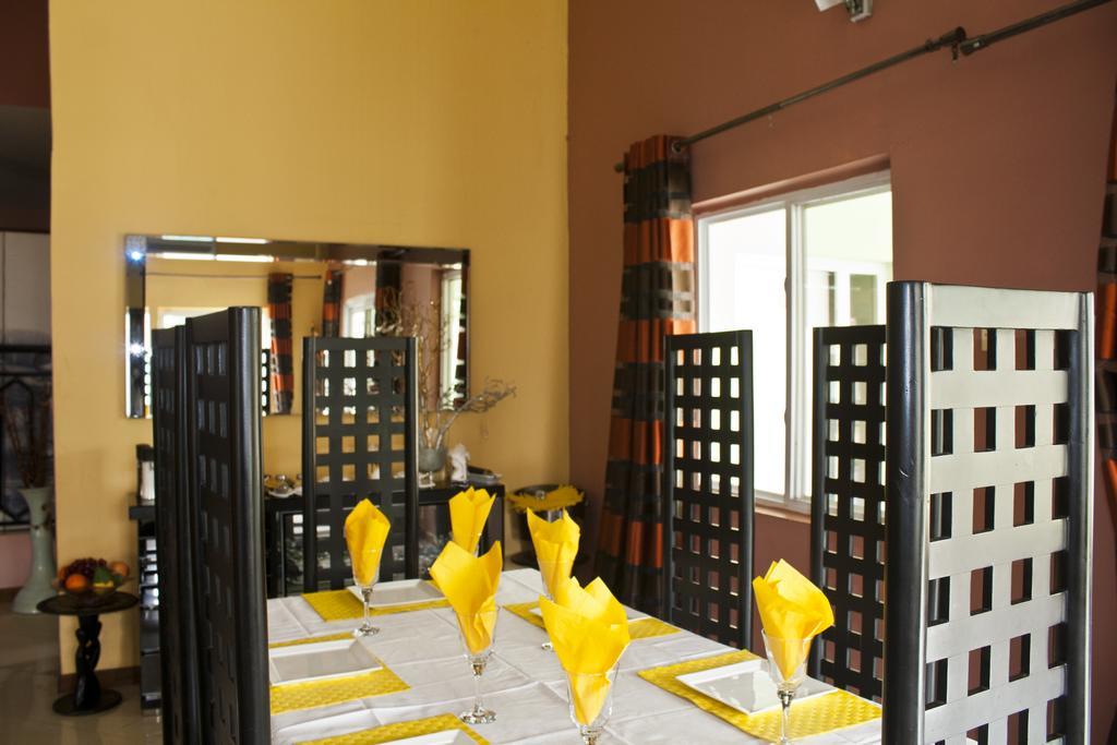 Quest Lodge Spintex Esterno foto