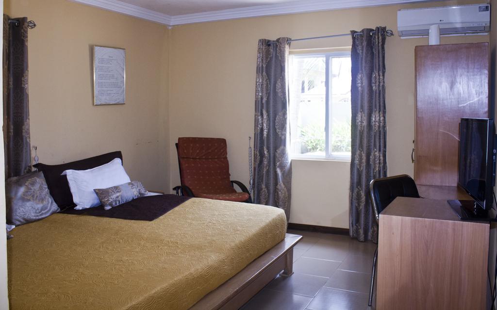 Quest Lodge Spintex Esterno foto