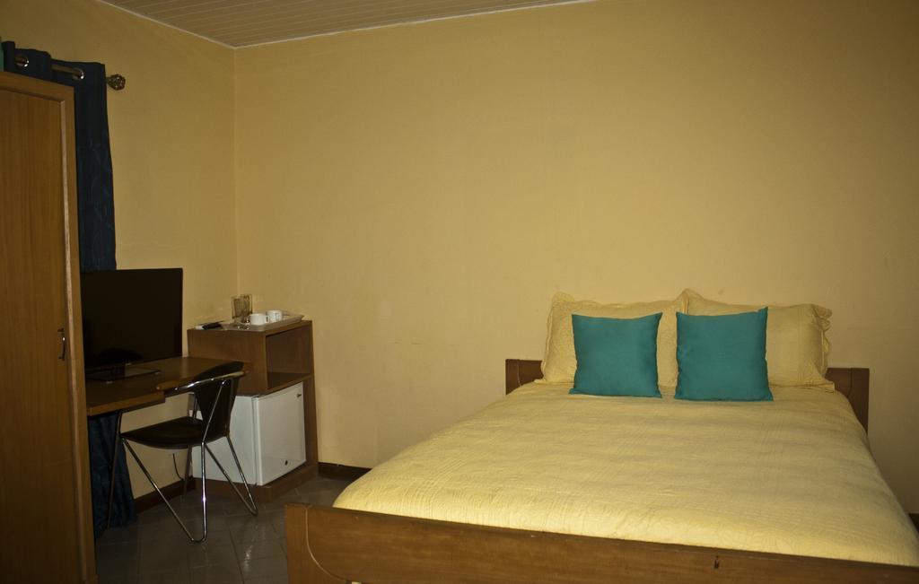 Quest Lodge Spintex Esterno foto