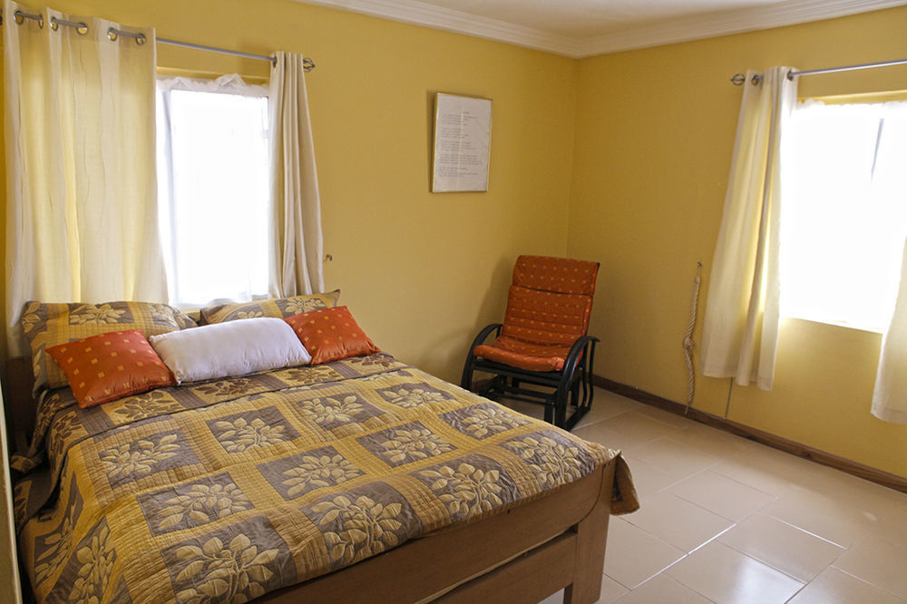 Quest Lodge Spintex Esterno foto