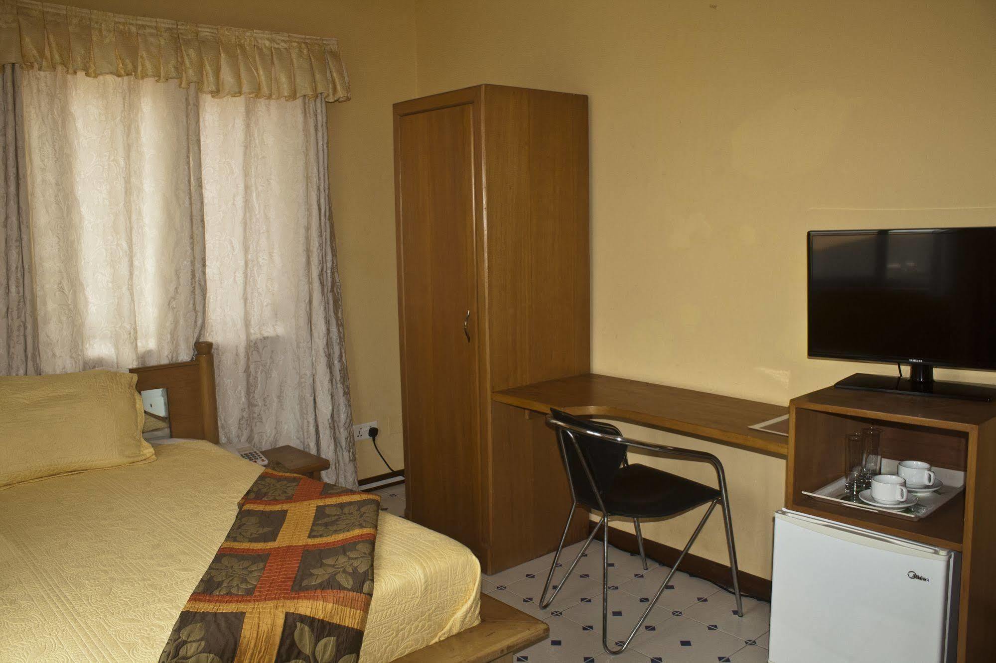 Quest Lodge Spintex Esterno foto