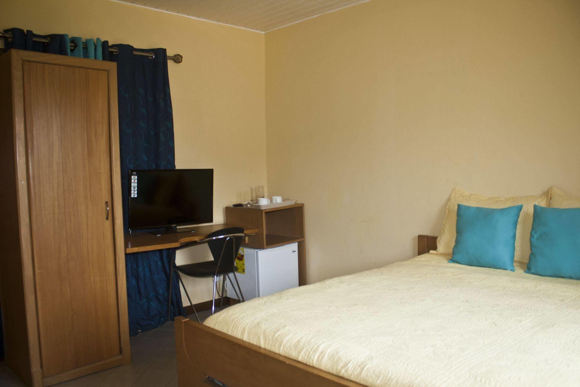 Quest Lodge Spintex Esterno foto